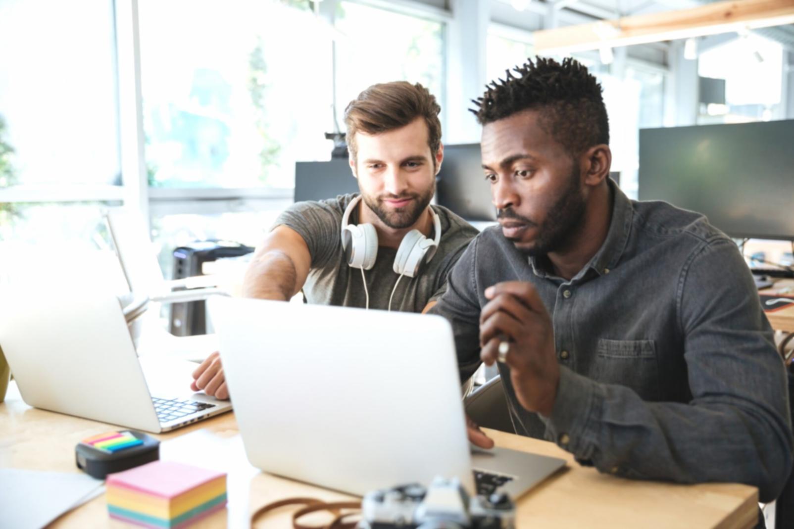 Group discussion during budget planning workshop with instructor providing guidance